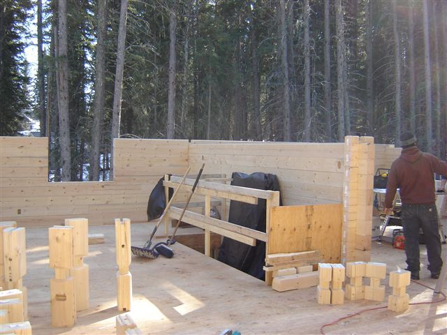 Calgary Log Home Project- Tamlin Homes-bearing-wall-looking-east