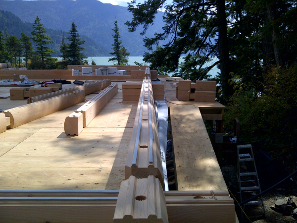 Tamlin Log Cabin Packages-Harrison Lake BC Project-laying_logs-b