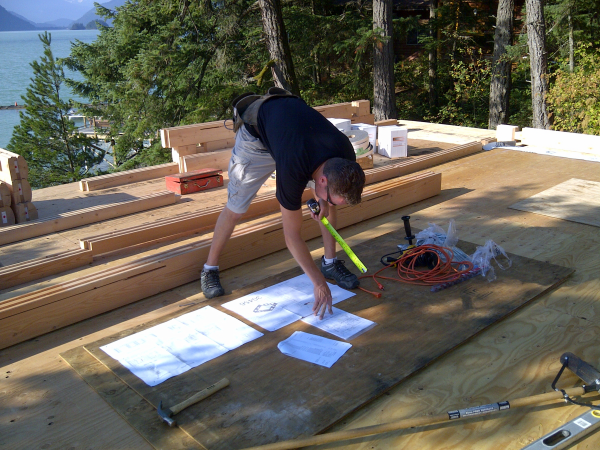 Tamlin Log Cabin Packages-Harrison Lake BC Project-laying_logs-d