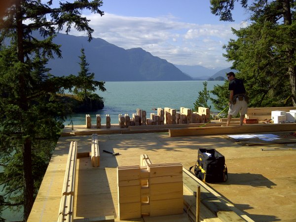 Tamlin Log Cabin Packages-Harrison Lake BC Project-laying_logs-e