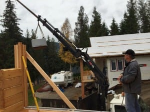 log home construction with crane